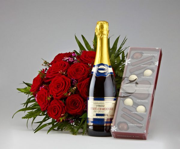 Røde roser, mousserende vin og chokolade