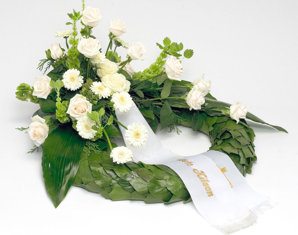 Hvad skriver jeg på et bånd til begravelse?