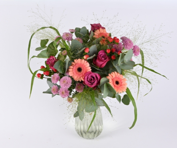 Buket i fersken, lyserød, pink og fersken.